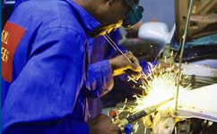 A mechanic welding at Stantech Motors garage