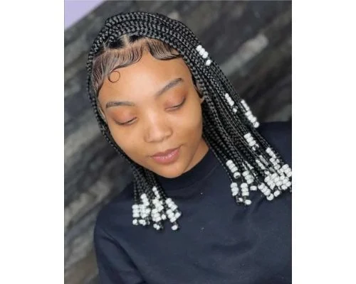 hairstyles with beads: box braids with white plastic beads